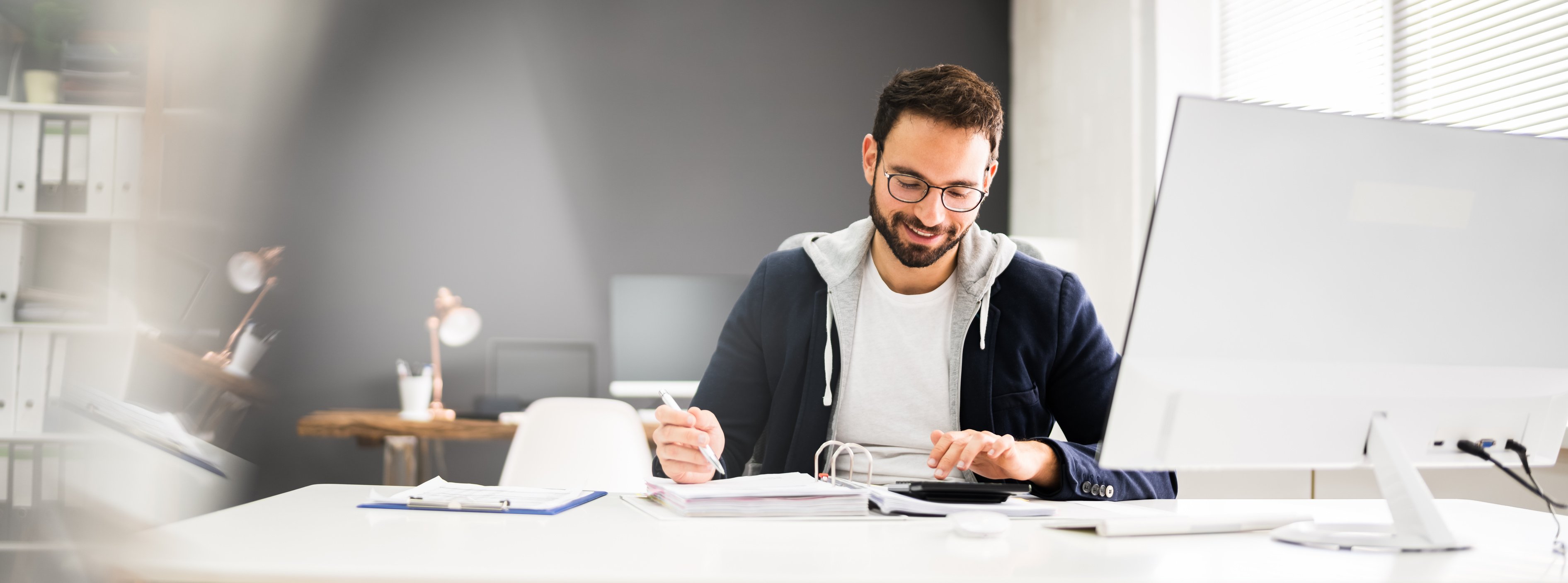 Tax Accountant Advisor Using Computer